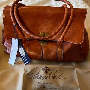 Never been used. Patricia Nash all leather purse perfect condition.